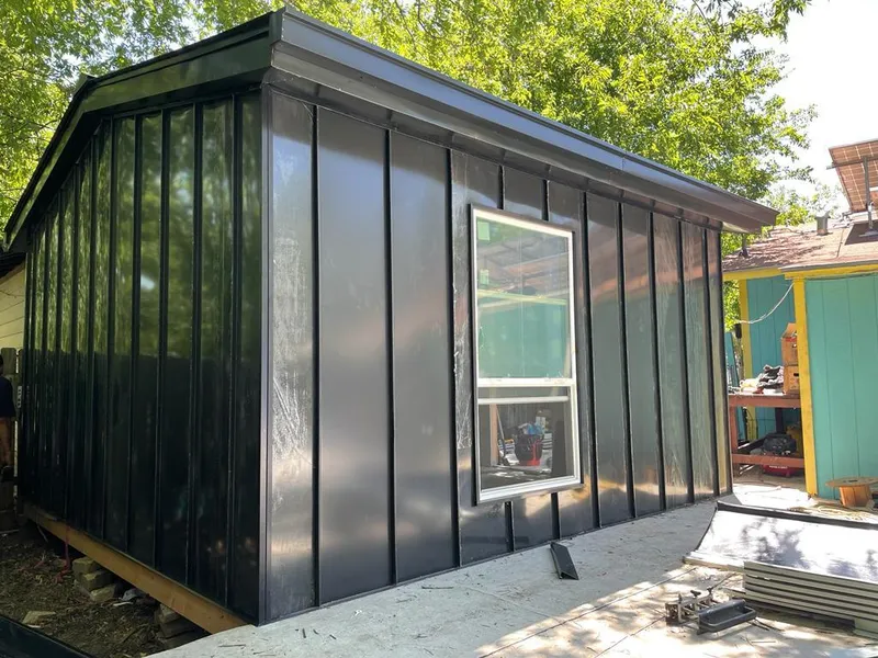 Black standing seam metal wall panels for Metal Roof Installation in Fairhaven