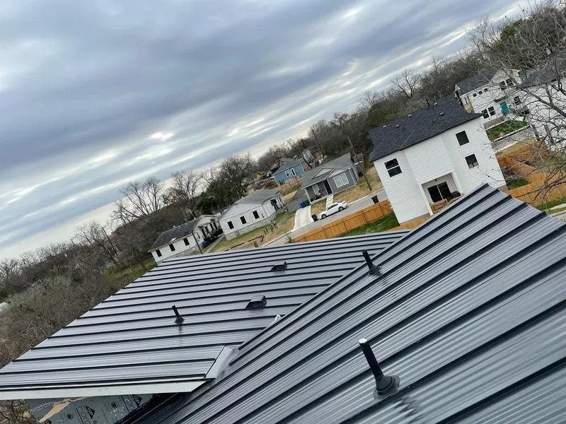 Standing seam metal roof panels with vents for Skylight Repair in Fairhaven